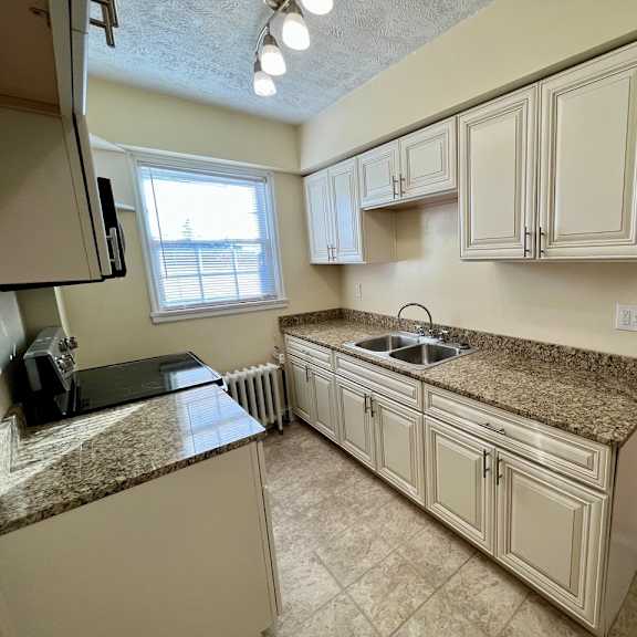 renovated kitchen in select apartment homes