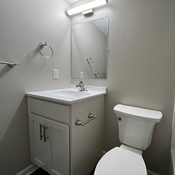 a small bathroom with a toilet and a sink