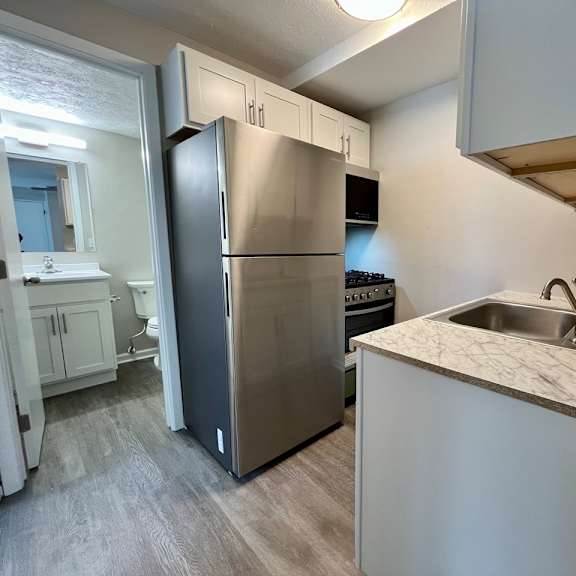 the preserve at ballantyne commons apartment kitchen and stainless steel refrigerator