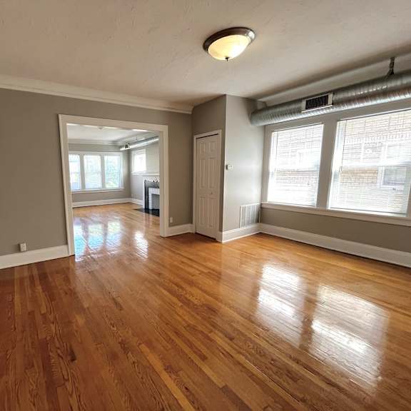 living room with wood floors and windows at integrity cleveland heights, cleveland heights, 44106
