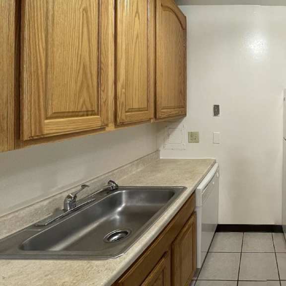 typical standard 2 bed 1 bath kitchen at jordan court apartments, integrity realty, kent