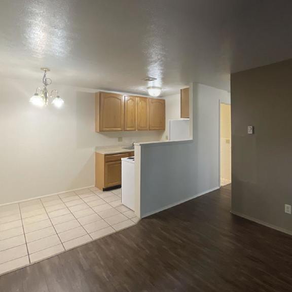 view from living room into kitchen at jordan court apartments, integrity realty, oh