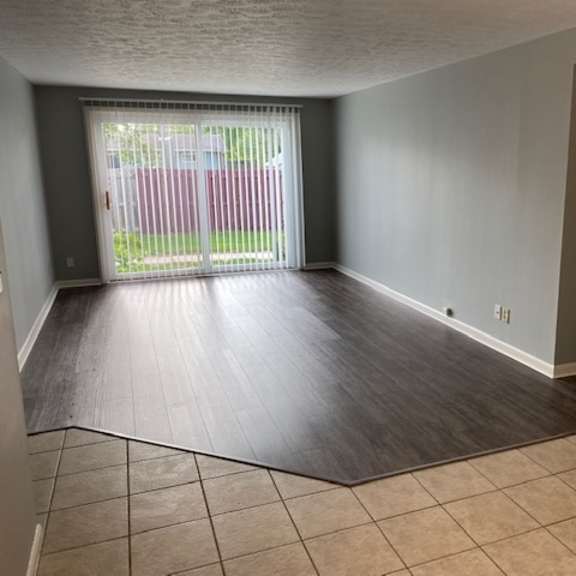 living room with plank flooring