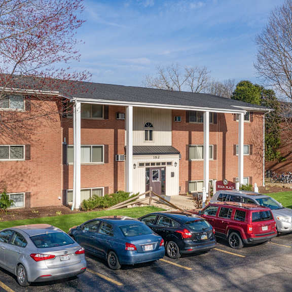 typical building with ample parking at ryan place apartments, integrity realty, kent, ohio