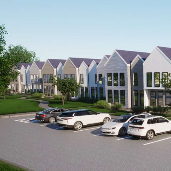 a row of houses with cars parked in front at westwood meadows, westlake, oh, 44145