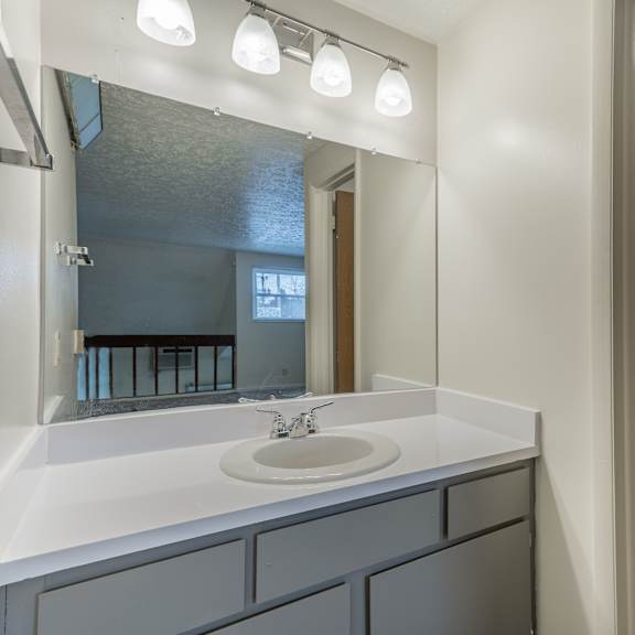 bathroom with bathtub at woodland pointe apartments and townhomes, integrity realty, ohio