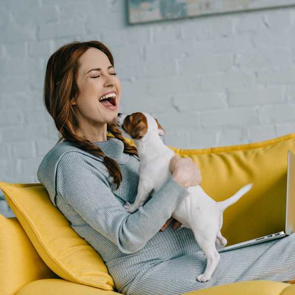woman with cute puppy