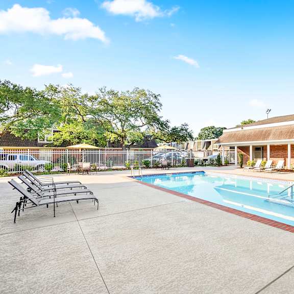 pool with lounge chairs