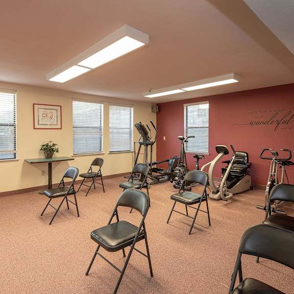 our fitness room is equipped with a variety of exercise equipment at hilltop commons senior living, grass valley, ca 95945