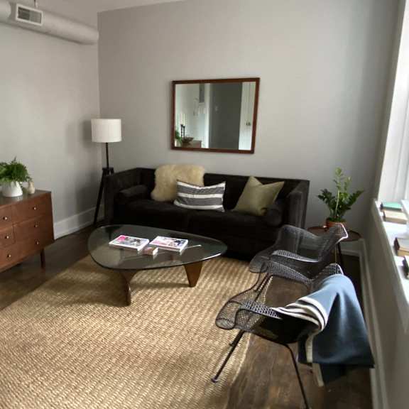 a living room with a couch and a coffee table