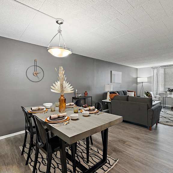 a dining room with a table set for a meal.
