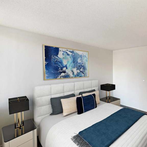 a bedroom with a large bed and a painting on the wall.