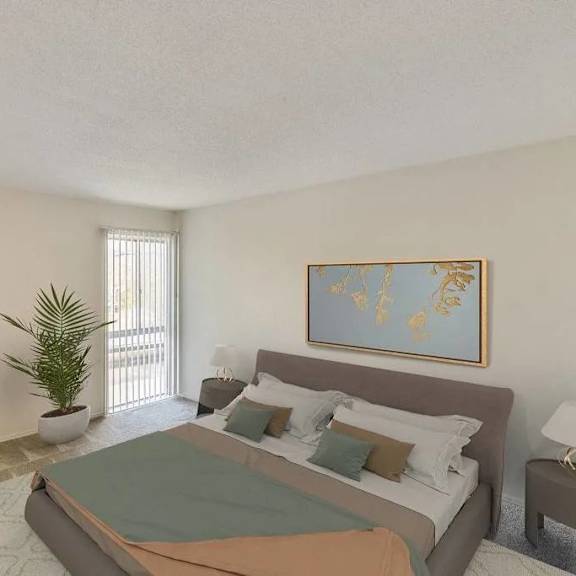 a bedroom with a bed, nightstand, and a plant.