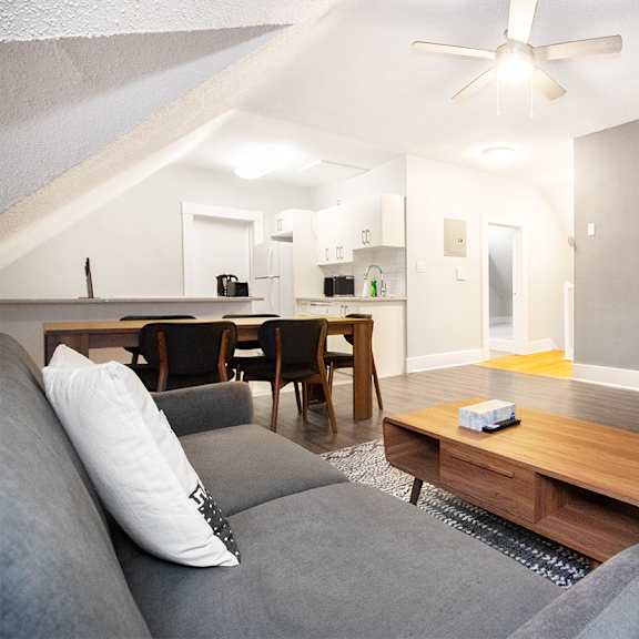 a living room with a couch and a coffee table