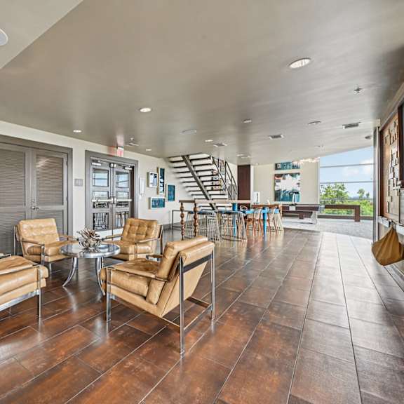 a living room with two chairs and a table.