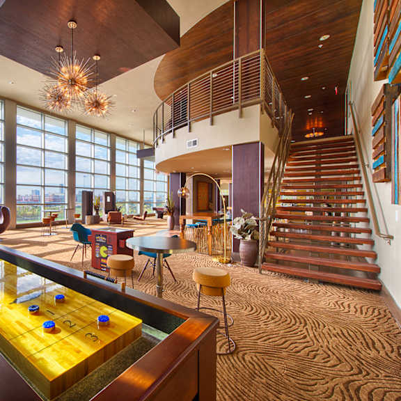 game room with shuffle board at revl heights, the barvin group, houston, tx, 77009