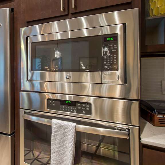 electric range in kitchen at revl heights apartments, the barvin group, texas