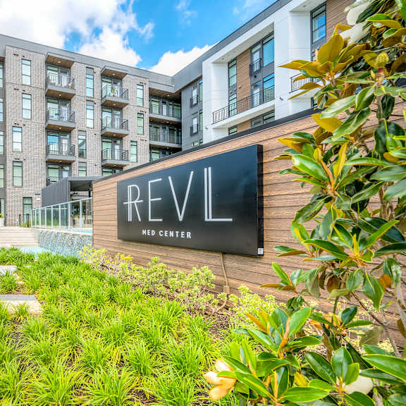 a large building with a sign that says revival on it