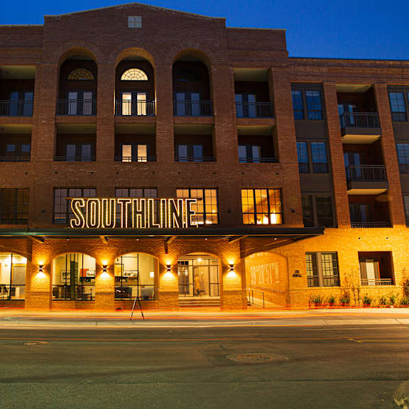 the southridge building is lit up at night.