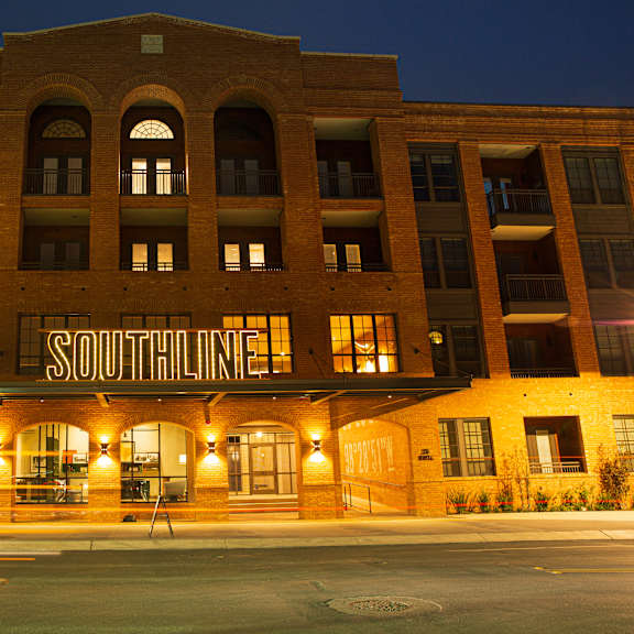 the southline building is lit up at night.