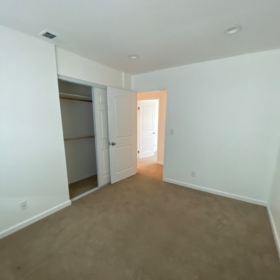 a white staircase with a light on top.
