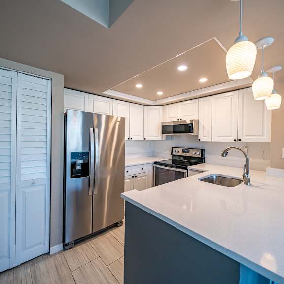 fully equipped kitchen at bella lago vista, west palm beach
