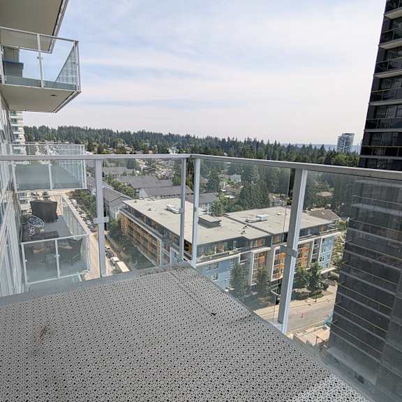 a view from a high-rise building looking down at a cityscape.