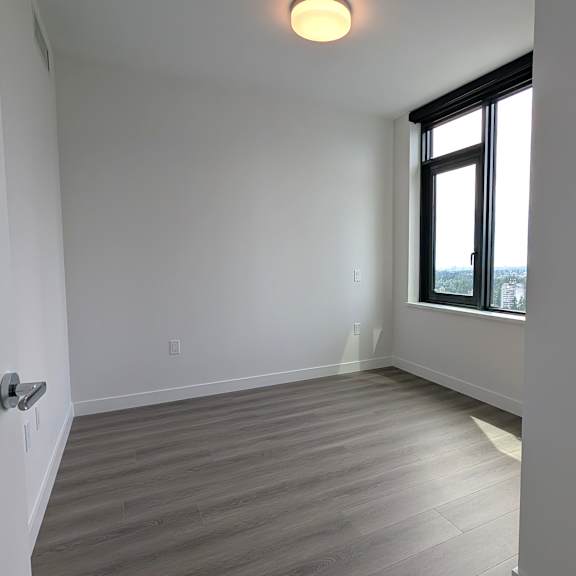 a room with a window and a door.