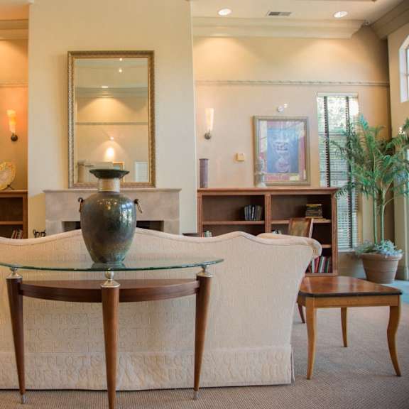 a living room with a couch and a table
