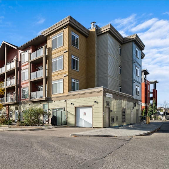 modern apartment buildings on the corner of a street