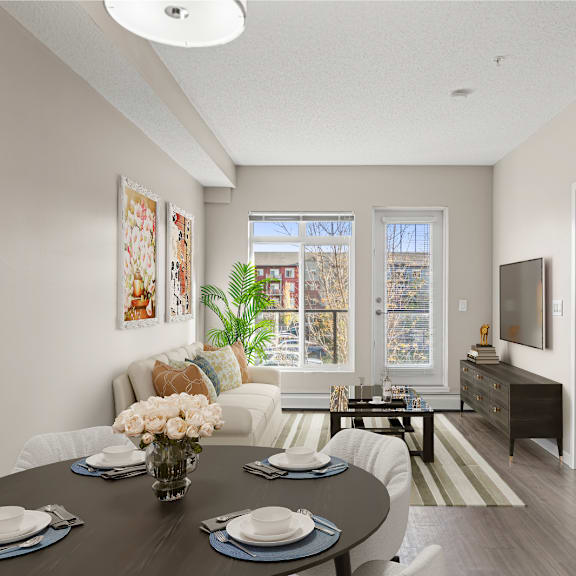 an open living room and dining room with a table and chairs