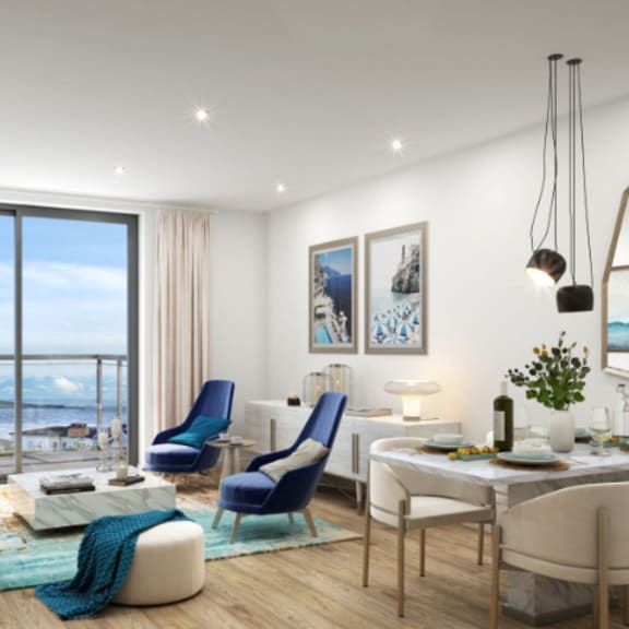 a rendering of a living room and dining room with a view of the ocean