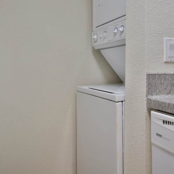 washer and dryer in unit at charbonneau, seattle, washington
