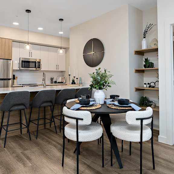 open concept kitchen and dining area at mac and mullen apartments, edmonton, t6r 0s7