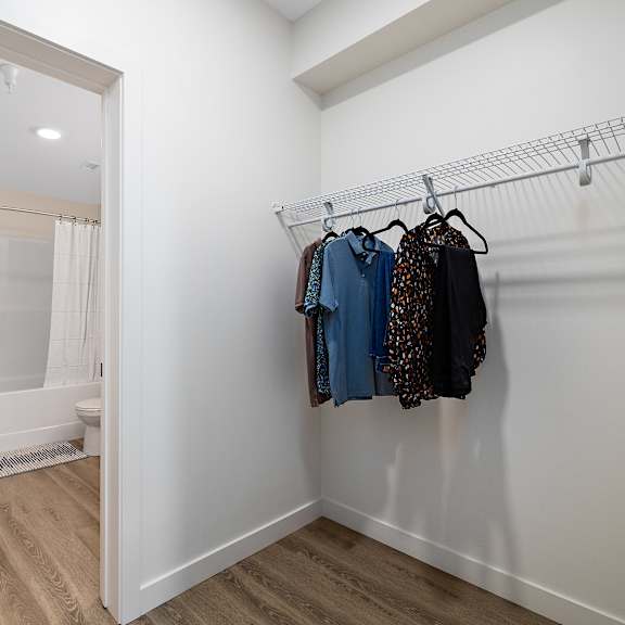 walk-in closet with wire shelving at mac and mullen apartments, alberta, t6r 0s7