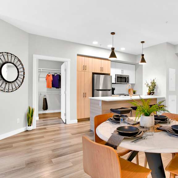 open concept dining room and kitchen at plaza apartments, calgary, ab
