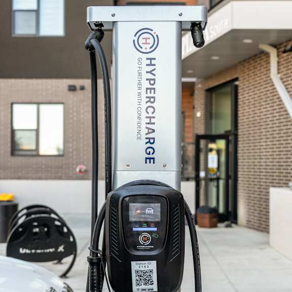 electric vehicle charging station at plaza apartments, calgary, ab