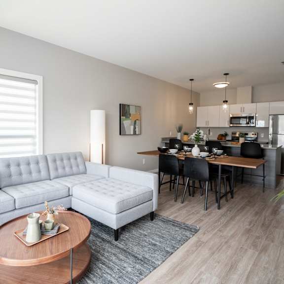 interior - wide shot of living room and kitchen area.