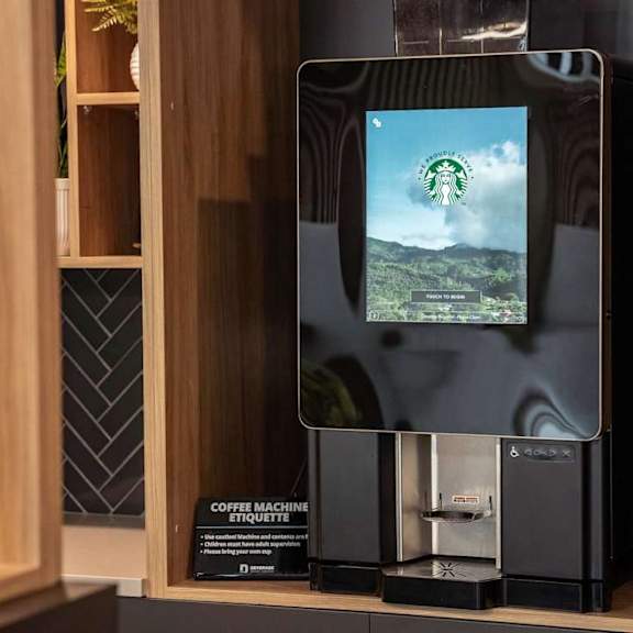 builtin coffee machine with touchscreen display at mac and mullen apartments, alberta, t6r 0s7