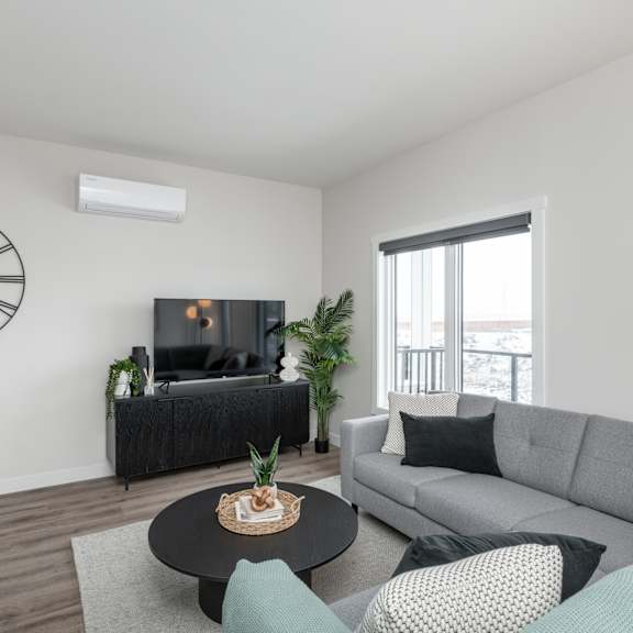 modern living room at latitude 49 townhomes, winnipeg manitoba