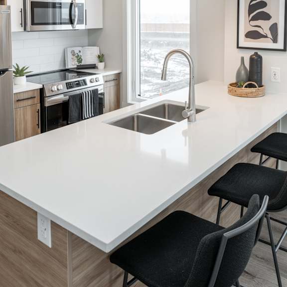 island kitchen at latitude 49 townhomes, winnipeg, r3x 0m1