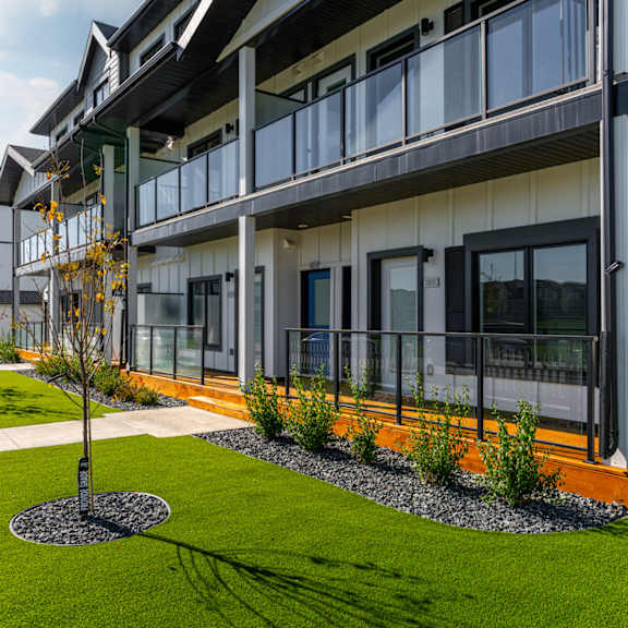 exterior green space at latitude 49 townhomes, winnipeg, mb