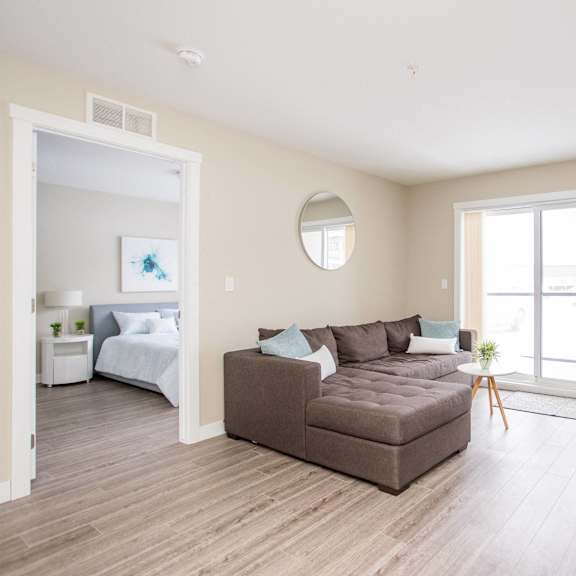interior - wide shot of living room and bedroom
