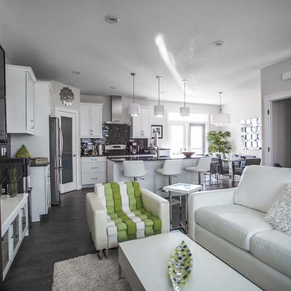 interior - wide shot of living room and kitchen area.