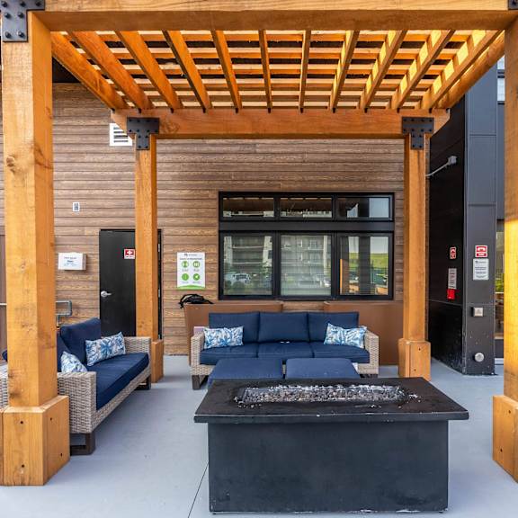 outdoor firepit patio at g17 apartments at tamarack, edmonton, ab