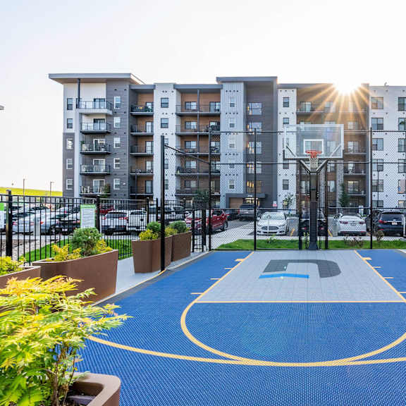 a basketball court at g17 apartments at tamarack, edmonton, ab