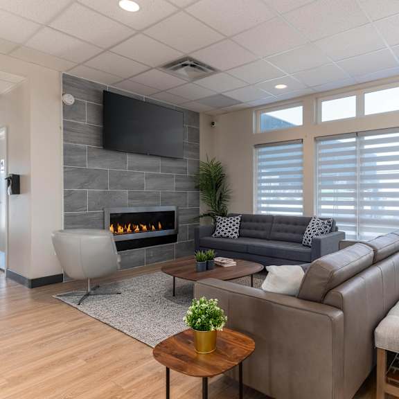 clubroom with fireplace at g17 apartments at tamarack, alberta, t6t 2m4