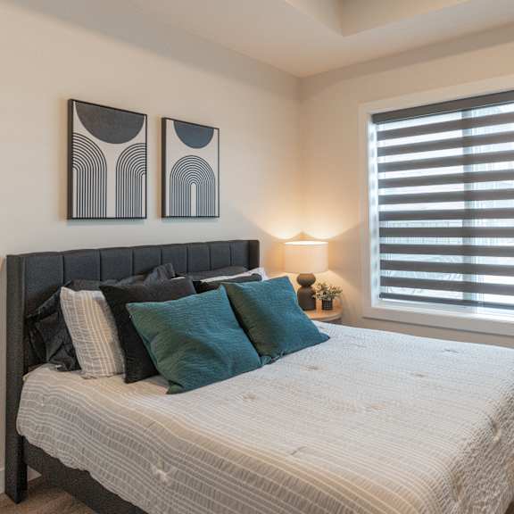 comfortable bedroom at vista apartments at edgemont, edmonton, ab