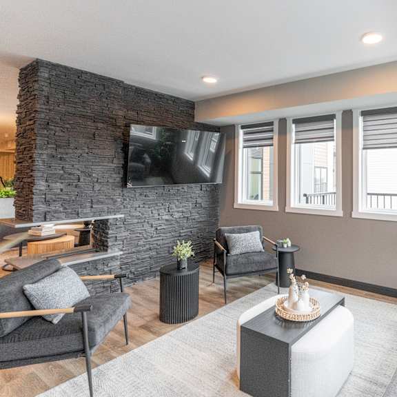 living room with tv at vista apartments at edgemont, edmonton alberta