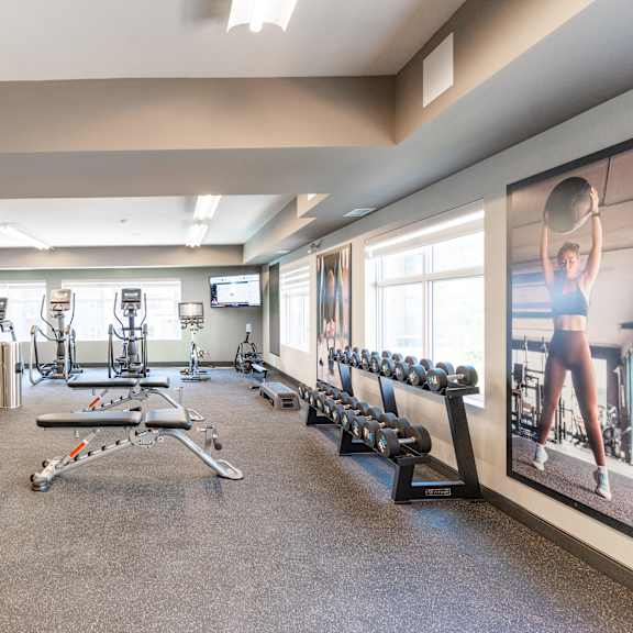 a spacious gym with variety of equipment at cadence at griesbach, edmonton, alberta